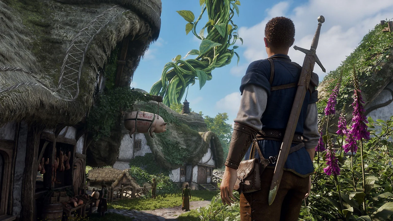 Fable hero looks toward a towering beanstalk over Albion